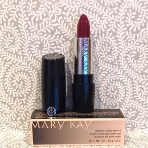 Mary Kay Lipstick in Bold Red with Classic Bullet Shape and Sleek Packaging